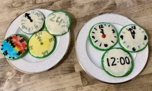 Cookies decorated to look like clock faces