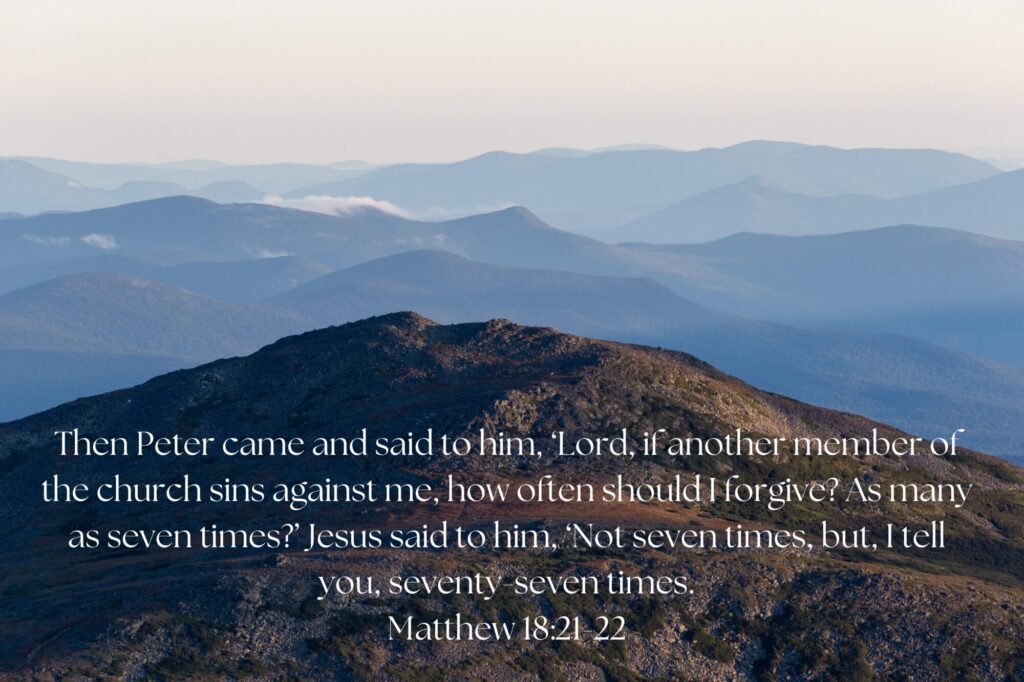 Rows of mountains form a background to a quote from Matthew 18:21-22.