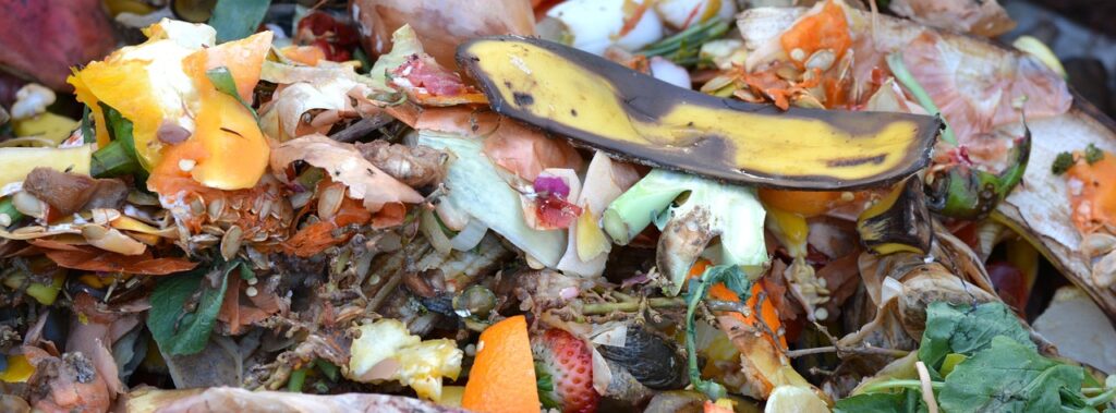 A pile of kitchen scraps sits in a pile to be composted.